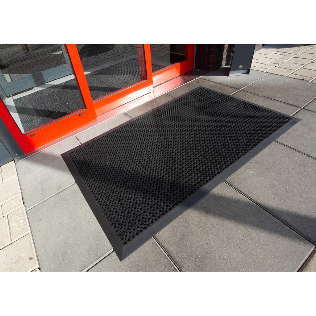 038.932.20_Alfombra_De_Rejilla_Drenante_Oct_O_Fle_X_Tm_Especial_Para_Acceso_De_Personas_Con_Movilidad_Reducida_Servitrapo